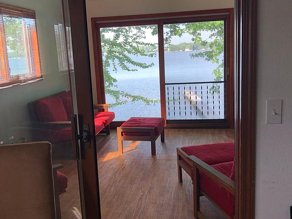 Wonderful sunroom. No AC here. Shut off the rest of the house and open the windows and let the breezes blow softly in.