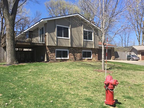 Immulate home complete with new siding and new windows!  Large private professionally landscaped and fenced back yard.