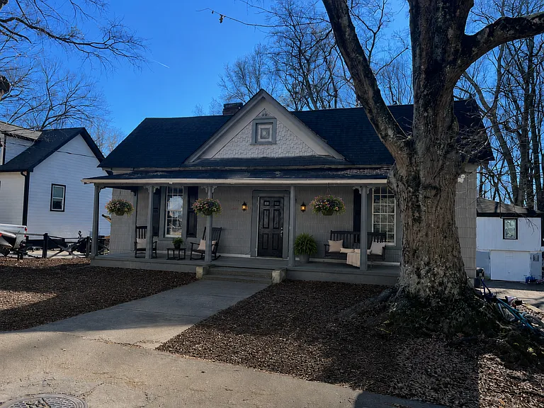 We used AI, but you can put your own design skills to work with this full-length, extra deep front porch. Beautiful cement columns and decorative woodworking make for a very charming area to relax any time of day!