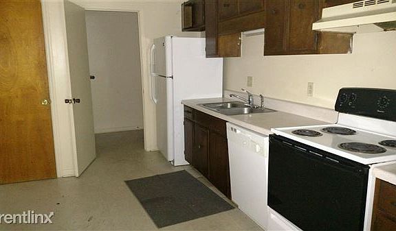 Kitchen with fridge and stove