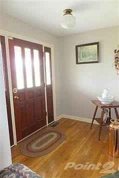 Front foyer has nice hardwood floor.
