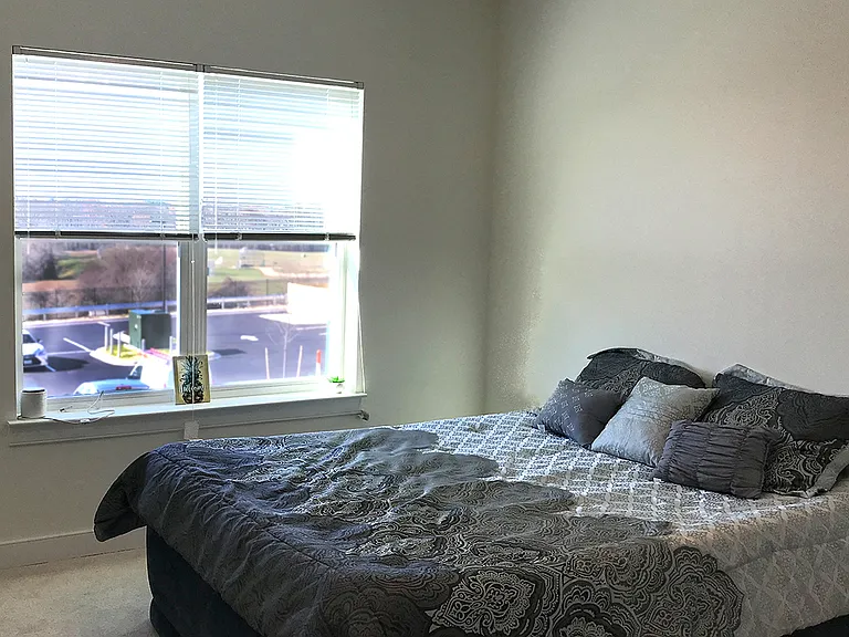 Comfortable bedrooms with plush wall-to-wall carpeting
