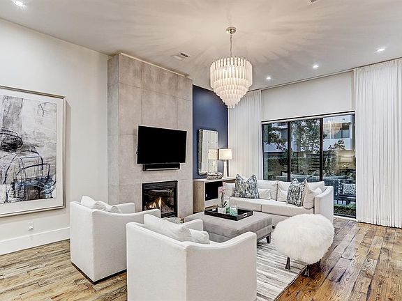 Eleven foot ceilings and a desirable open concept make this stunner fun for bringing family together as well as providing effortless flow as you entertain.