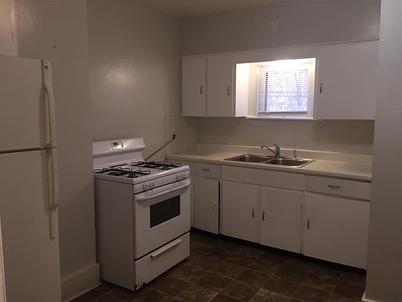 Newer gas stove & fridge are included