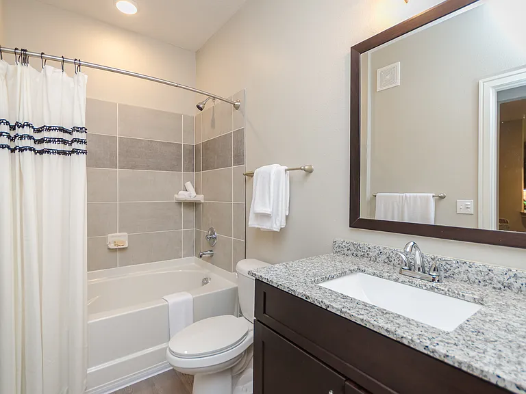 Bright and thoughtfully-designed bathrooms made for daily ease.