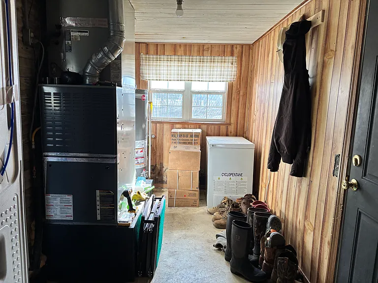 Laundry/Utility (this is from standing in front of washer/dryer; door to the right goes outside and then there is a door to the left that goes into the house)