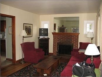 Sunny living room with fireplace