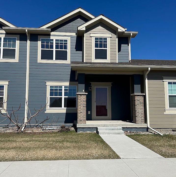 Storm door to let in extra light, and space to relax on the cozy front porch