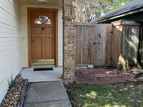 Front door of the house & gate to backyard