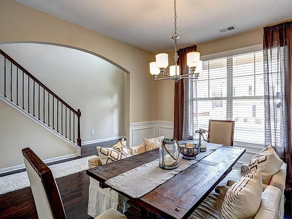 Dining room w upgraded hdwds