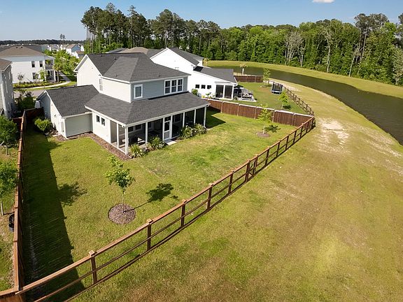 Nearly .25 acre lot with 8' fence