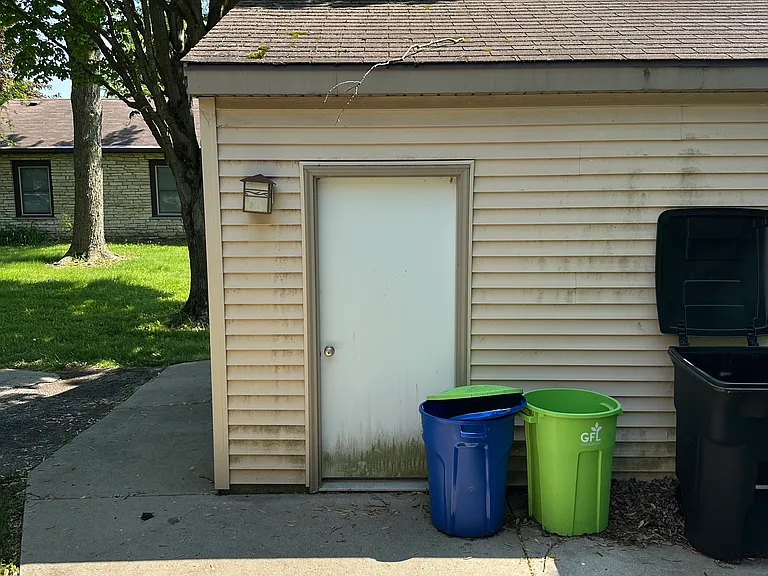 View of detached garage from back deck