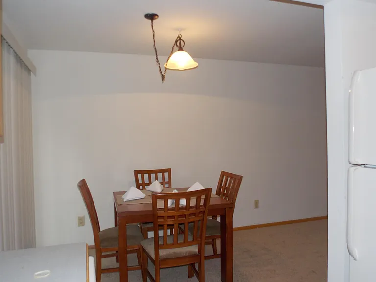 Dining area on the main level next to the sliding glass door
