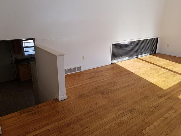 Living/stairs to kitchen