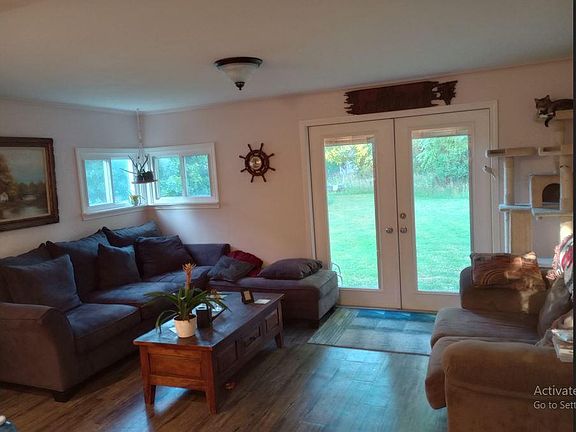 Open concept. Rear is set up as a seating area but can also be used as overflow from kitchen area. Home is full of great entertaining spaces. Easily entertain 20+ guests and feel comfortable. Great views of the backyard.