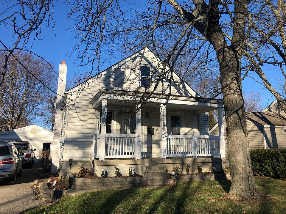 Front of house. Garage on left.
