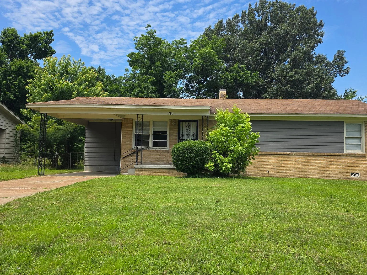 Charming 3-Bedroom Home with Fireplace, Carport & Fenced Backyard — Photo 2
