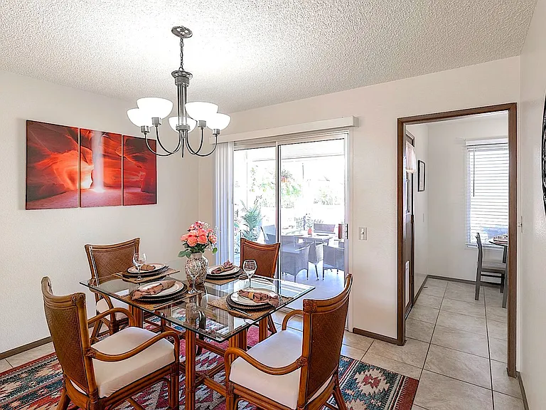 Enjoy views of your desert oasis while dining or combine both areas for entertaining guests.