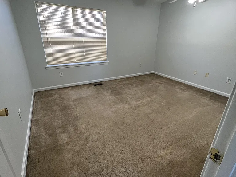 master bedroom with skylight