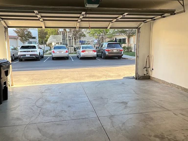 Different view of the spacious, private, 2 car garage.
