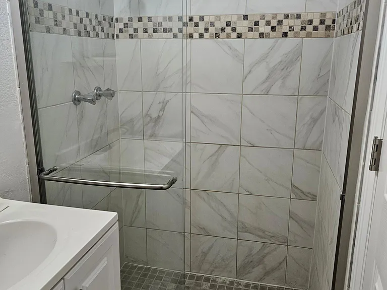 Lower bathroom Shower only with sink and toilet