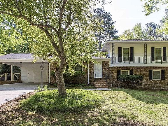 Spacious corner lot. Two-car carport.
