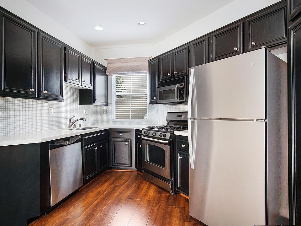 Kitchen is cozy and fridge is included