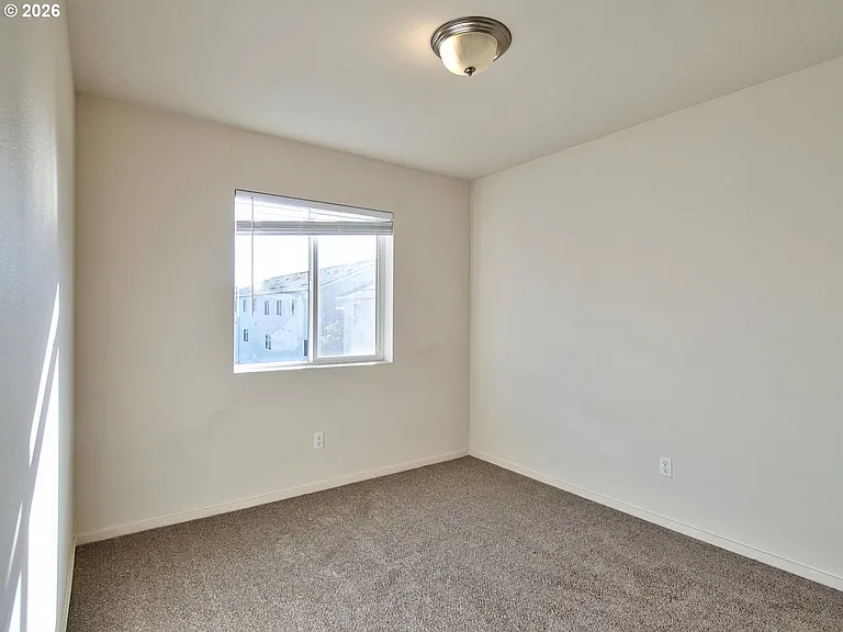 7751 NW Spirea St — Photo 13