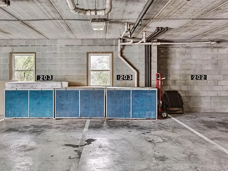 2 assigned parking spaces included. There is also storage for beach gear.