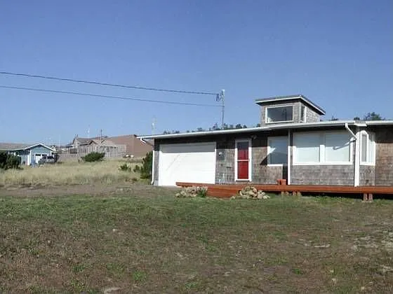 2105 NW Oceania Dr photo 1