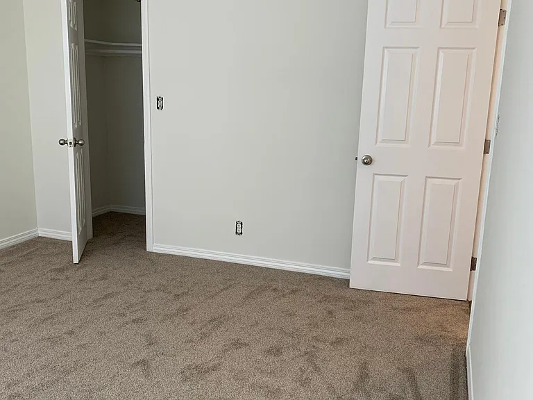 bedroom #3 (11x13) toward doorway & walk in closet