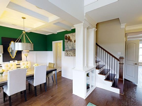 Beautiful entry with formal dining room