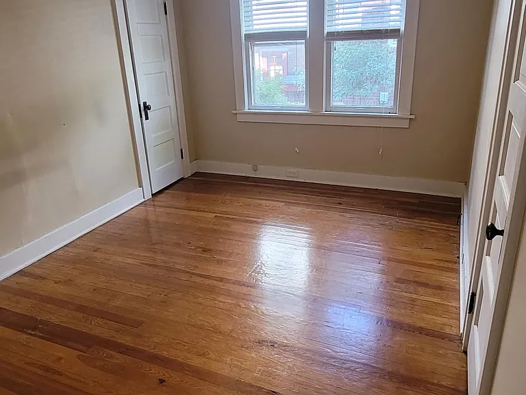 Master bedroom with two walk-in closets