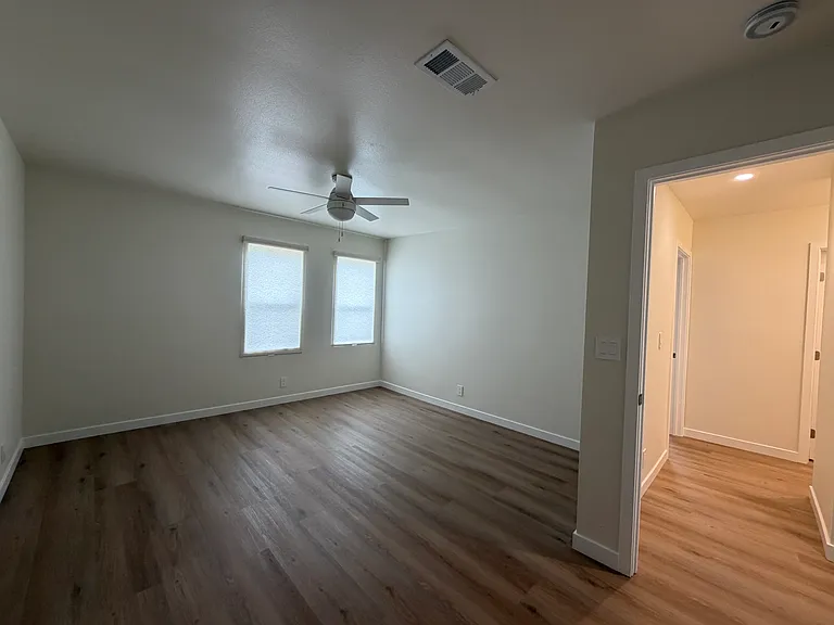 Primary bedroom and hallway