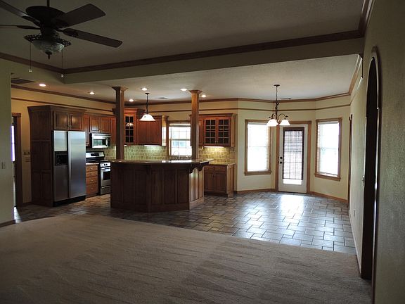 Open living , kitchen and dining area.