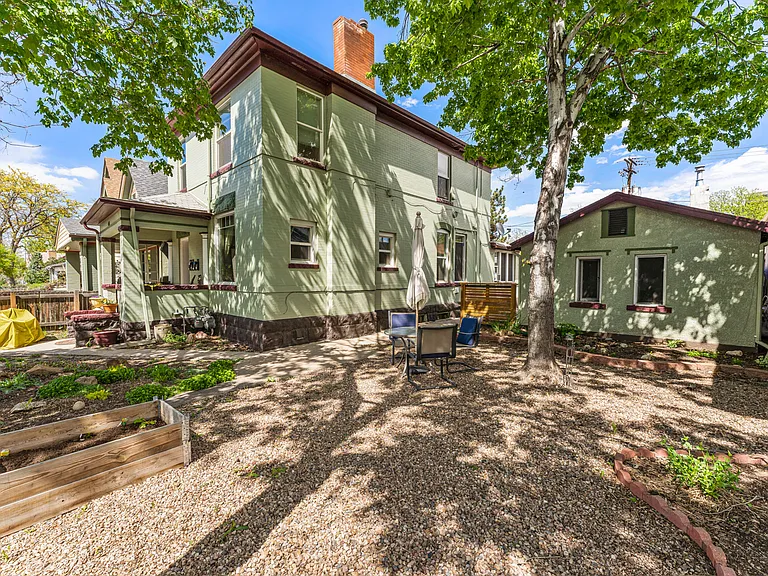 Shady, shared porch and yard.