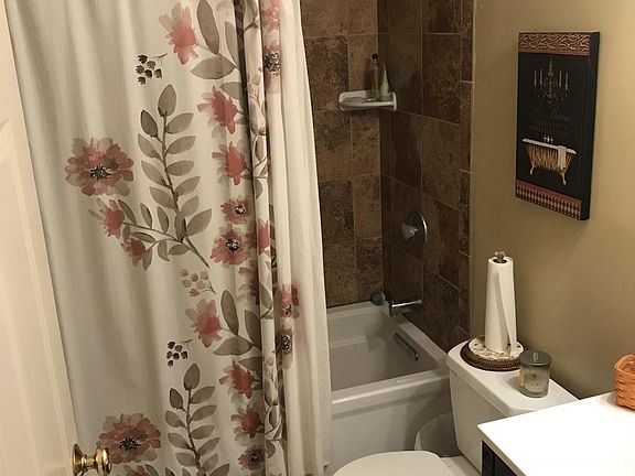All tile shower in upstairs bath.