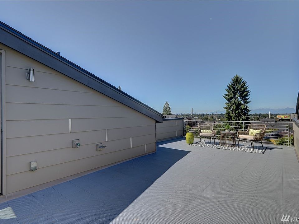 Rooftop deck with territorial views including Mt Rainier and Olympic Mountains to the west