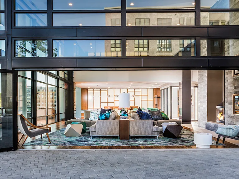 Indoor/Outdoor Lounge Space in Our Clubhouse
