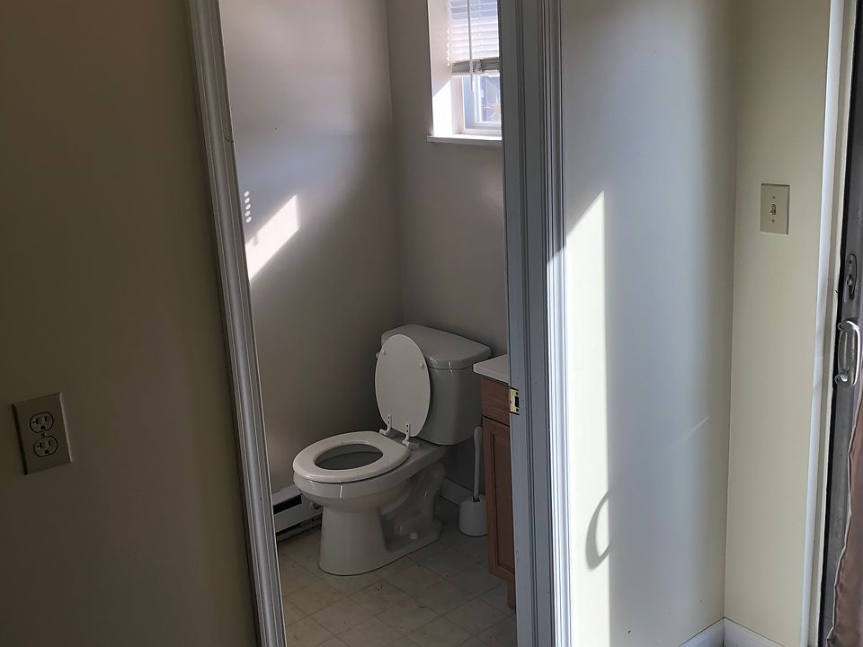 First floor full bathroom & sun room