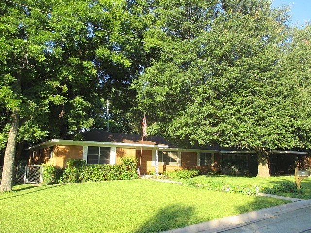 One attractive home and property on a .49-acre lot
