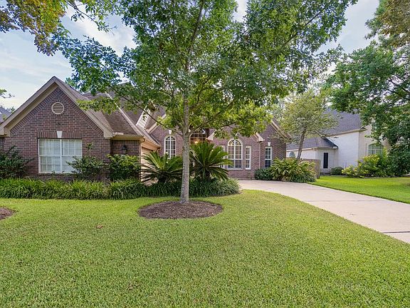 A swing driveway leads up to a 2-car attached garage and provides ample parking for residents and guests alike. The garage has epoxy flooring, a built-in workshop and extra storage!