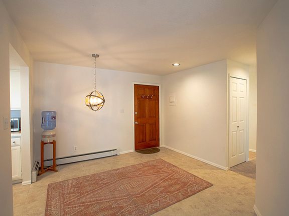 View from living room to dining area. (New overhead light adjustable).