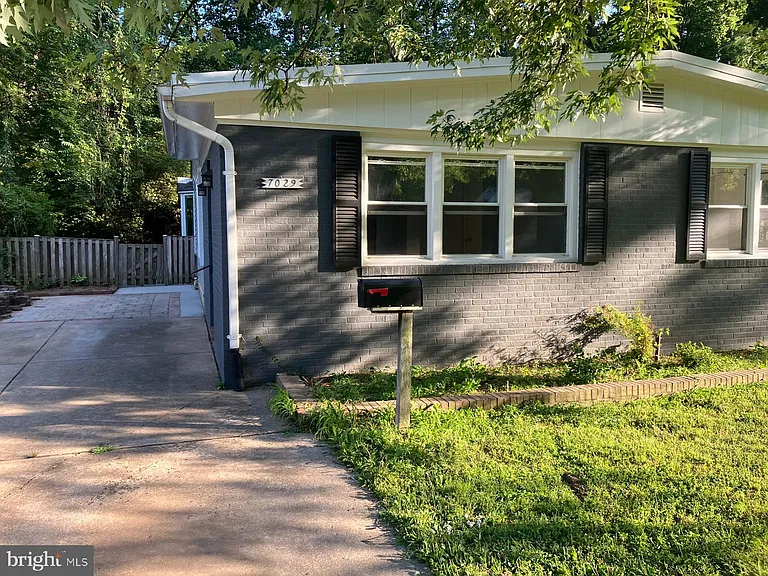 7029 Woodley Ln — Photo 3