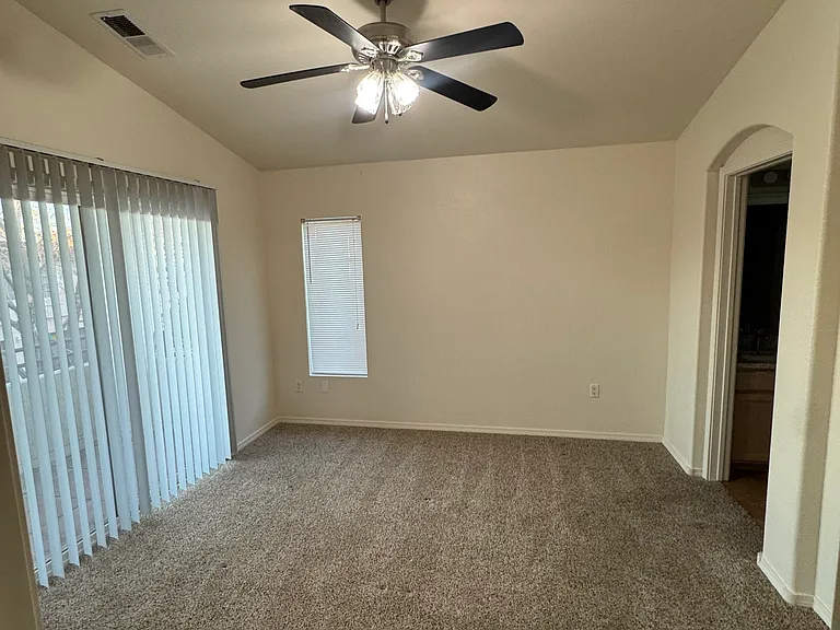 Primary bedroom. Comfortably fits a king-size bed.