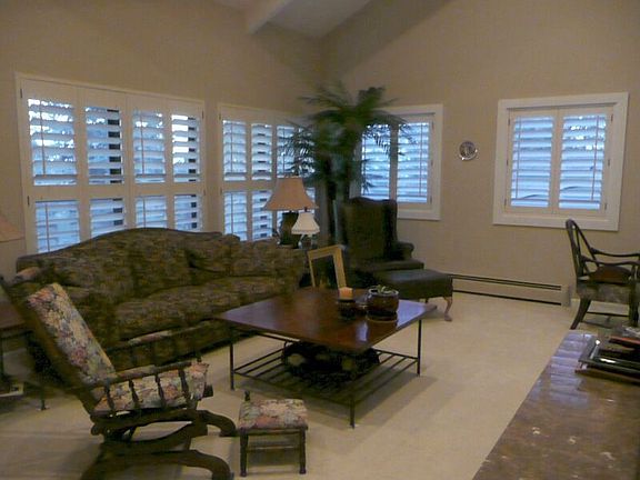 PLANTATION SHUTTERS ENHANCE FAMILY ROOM