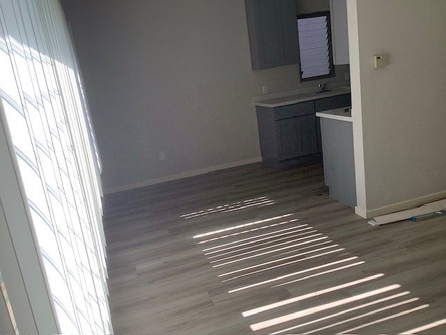 Dining room and kitchen seen from front door area.