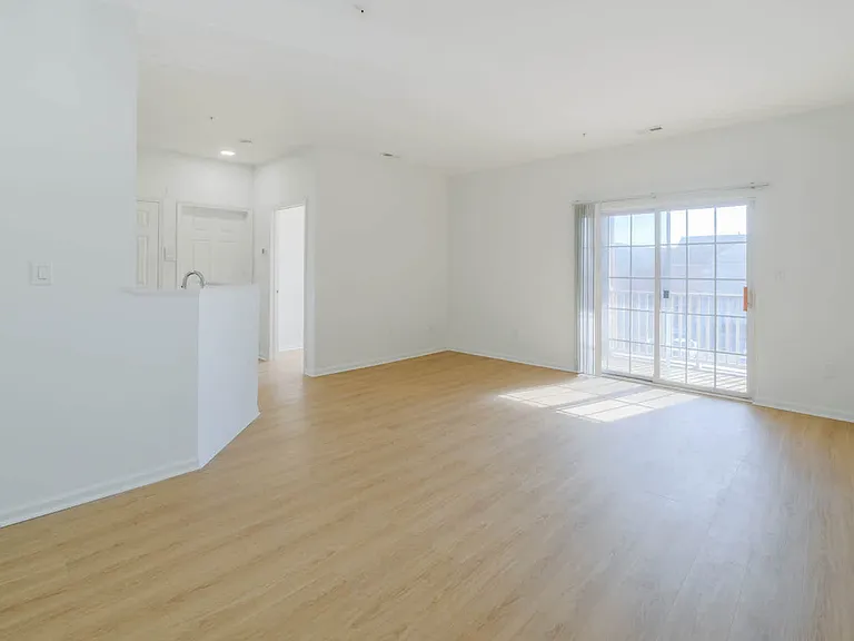 Living Room with Balcony and Hard Surface Flooring