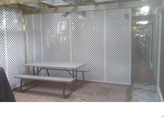 Private patio ideal for grilling, level from living room thr