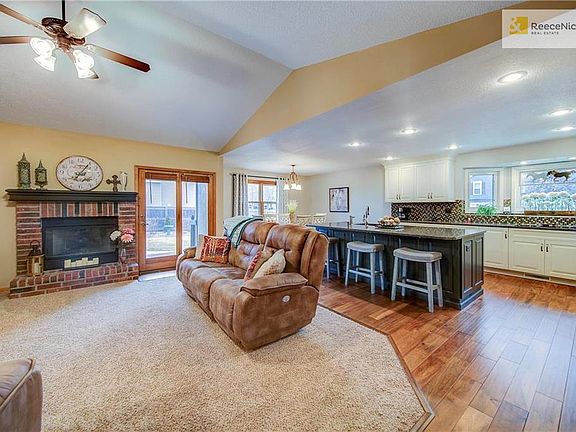 Great room walks out to the covered deck and patio!